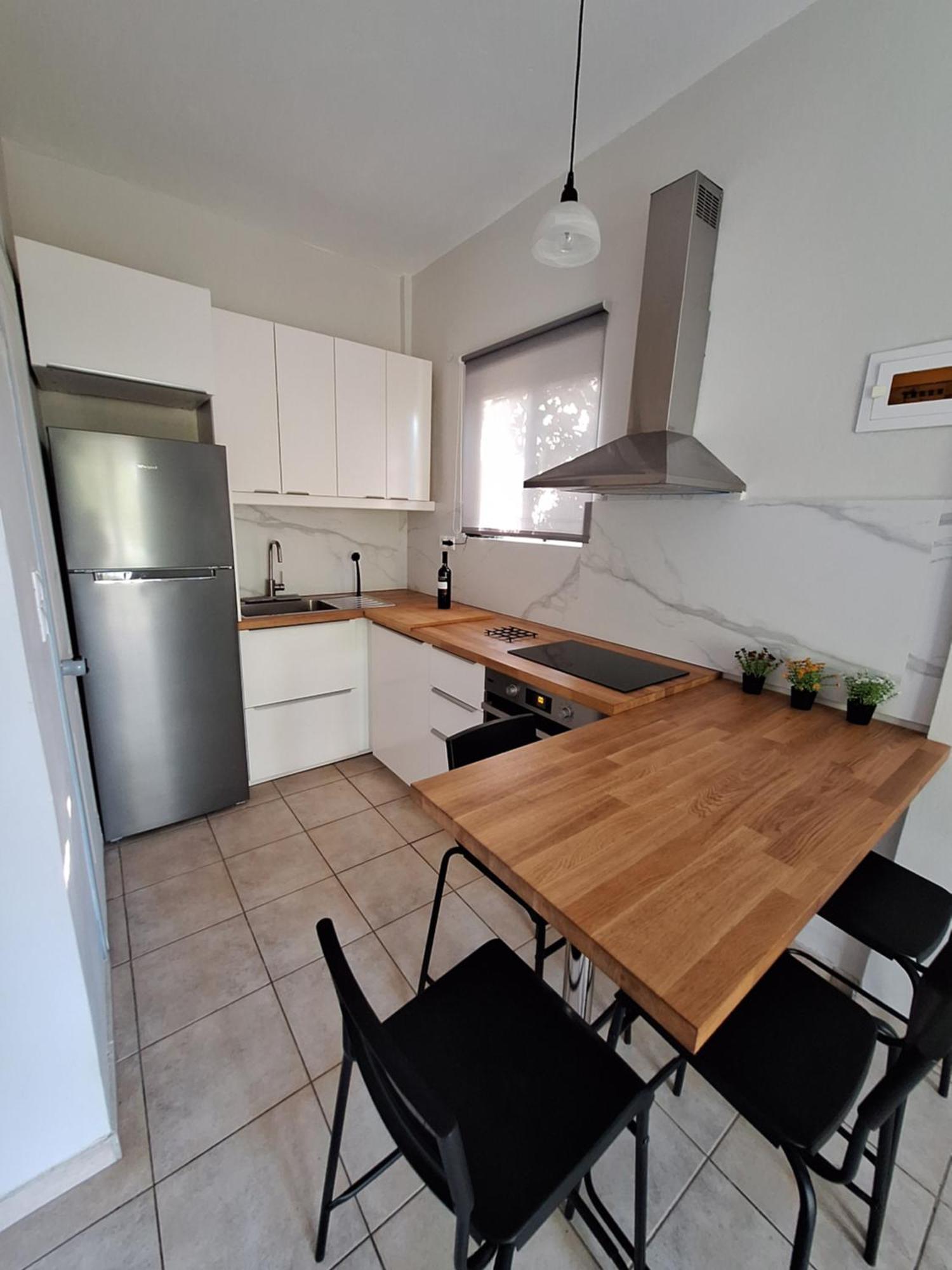 Artemis Apartments Kalyves Bagian luar foto